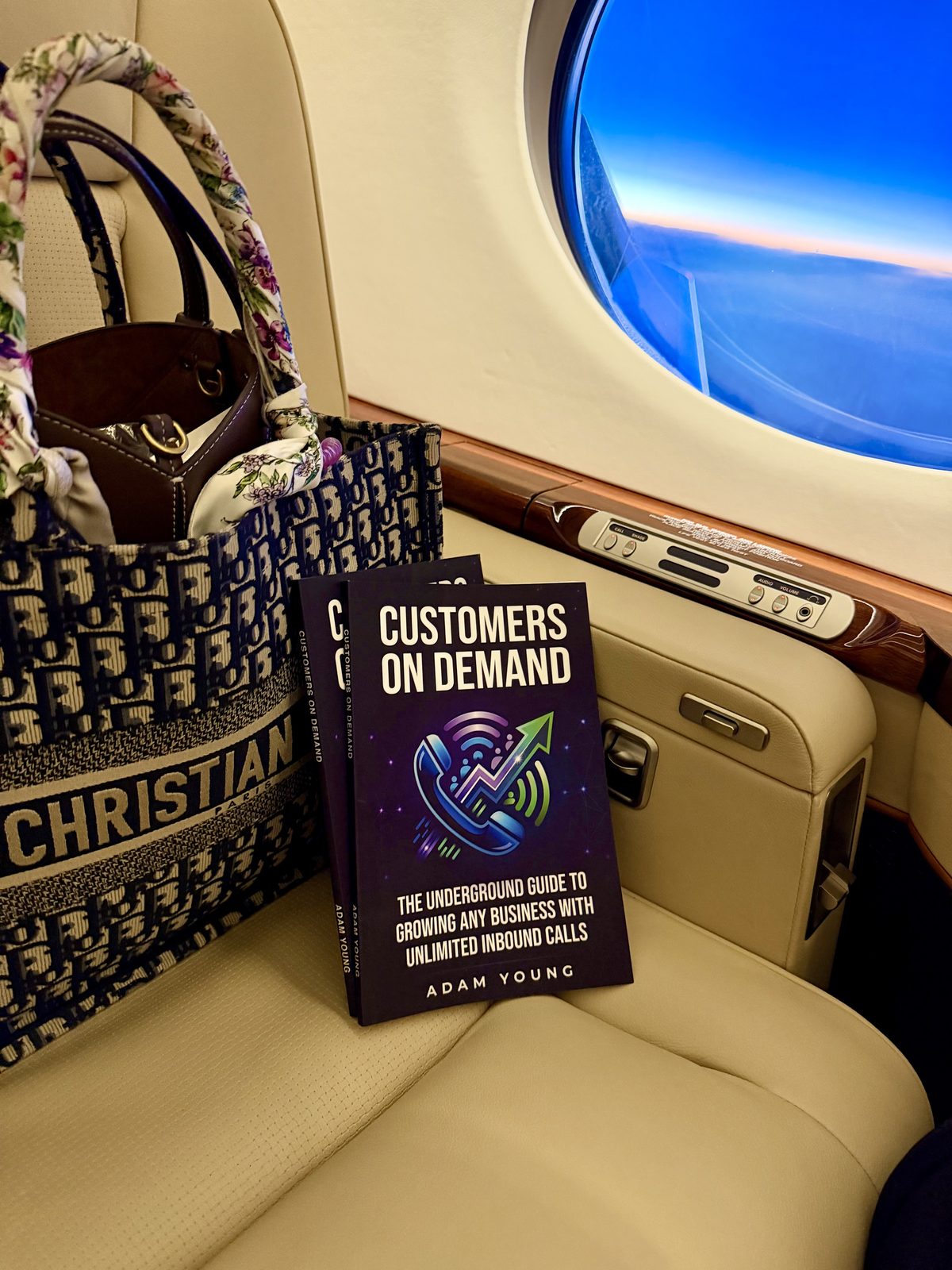 Customers On Demand by Adam Young, photographed on a jet seat