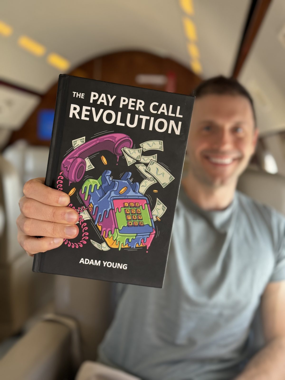 Adam Young with The Pay Per Call Revolution aboard a jet